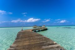 Soneva Jani Boardwalk Over Ocean Blue Sky