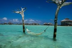 Soneva Jani Overwater Hammock in Lagoon